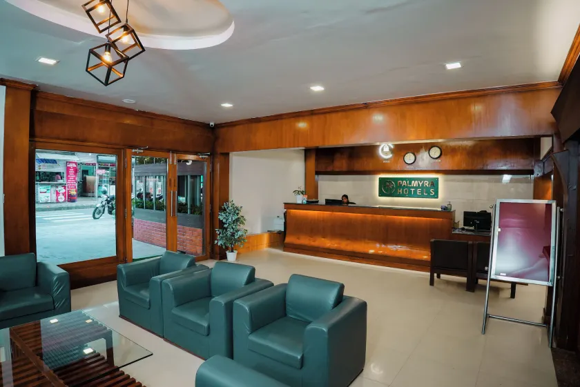 Hotel Palmyra Grand Inn - Image 1