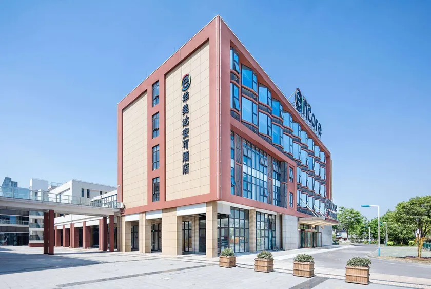 Ramadaencore By Wyndham Shanghai Pud ong Airport -Provide free 24hour shuttle bus service for airport pick-up and drop-off at Pud ong Airport - Image 1