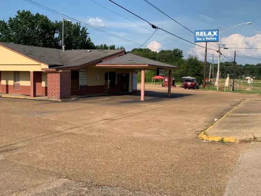 Relax Inn & Suites - Image 1