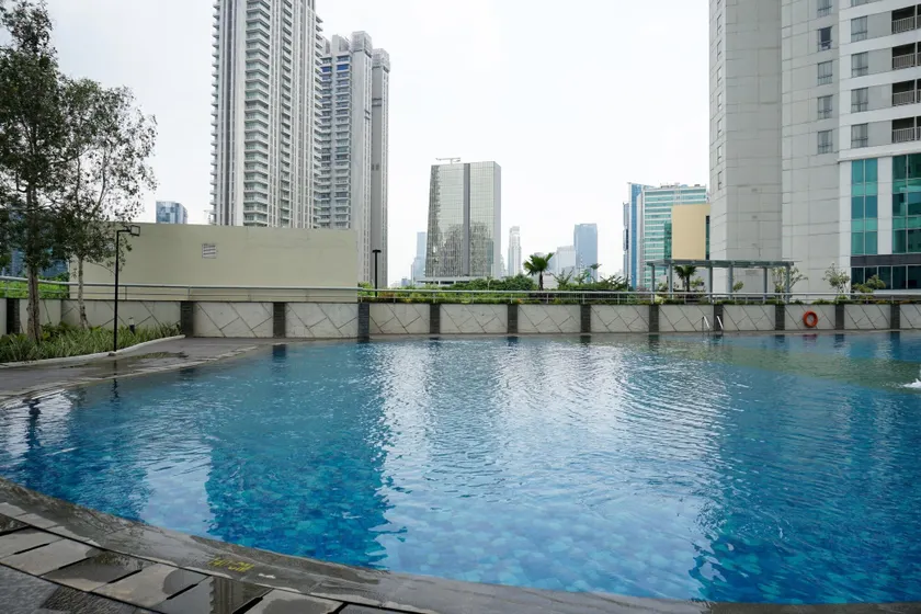 Nice and Homey 1BR at The Wave Kuningan Apartment By Travelio - Image 1