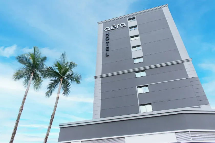 Aera São José Floripa - Hotel com café da manhã incluso e a passos do Shopping Itaguaçu - Image 1
