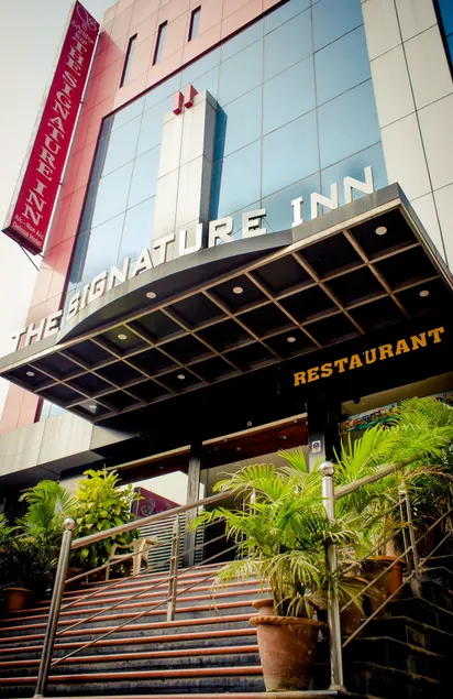 The Signature Inn Hotel - Image 1