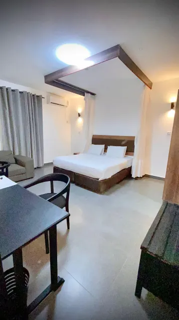 Armaan Suites and Restaurant - Zimmer