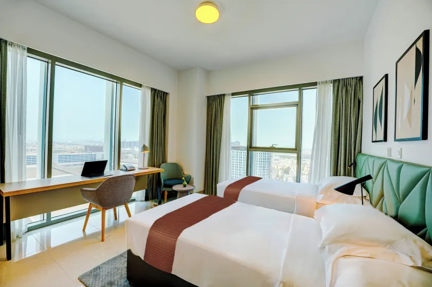 Capital Suites Hotel & Residences - Image 1
