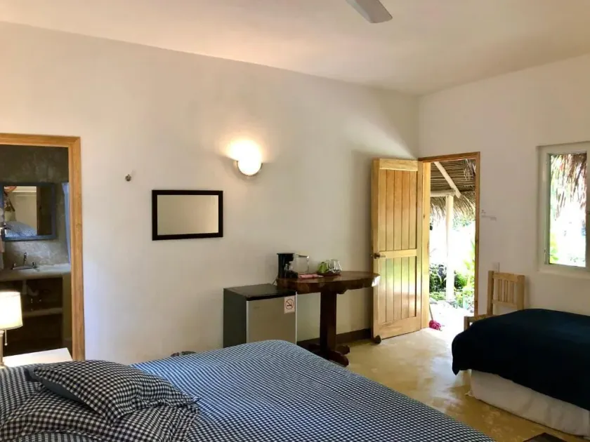 JUNTO AL RIO BEACHFRONT BUNGALOWS - Room