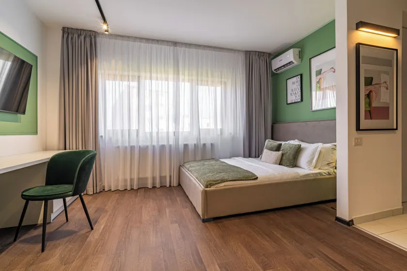 Cismigiu Park Studio - Fresh & Serene Flat with Light-Filled Interiors - Image 1