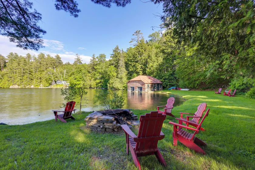 Expansive Eagle Lake Escape w/ Boathouse + Beach - Image 1