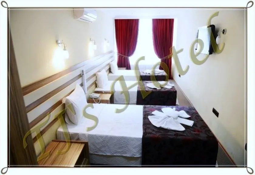 TJ's Hotel - Image 1