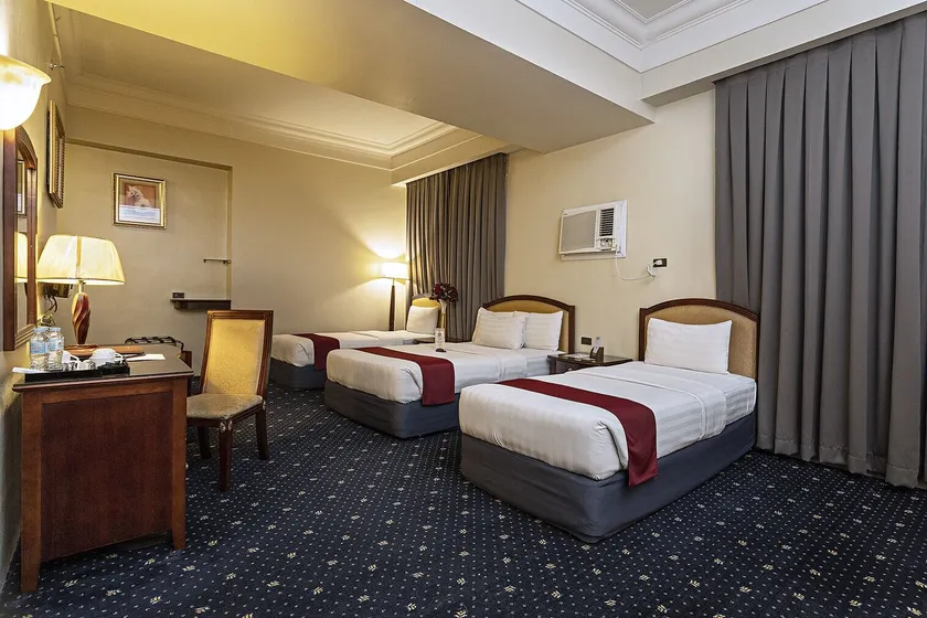 Sarrosa International Hotel and Residential Suites - Værelse