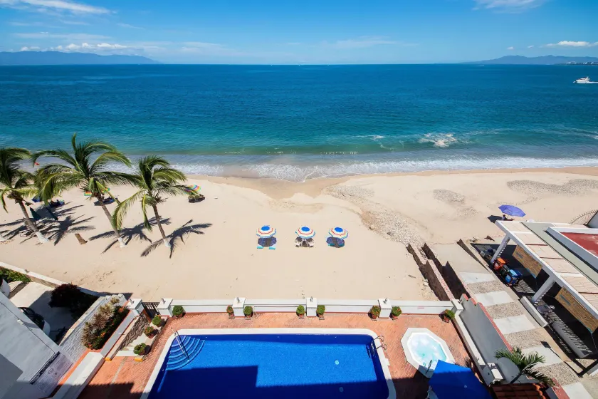 WIVC Casa de la Playa Condo - Literally on the Beach with Swimming Pool & Jacuzzi - Image 1
