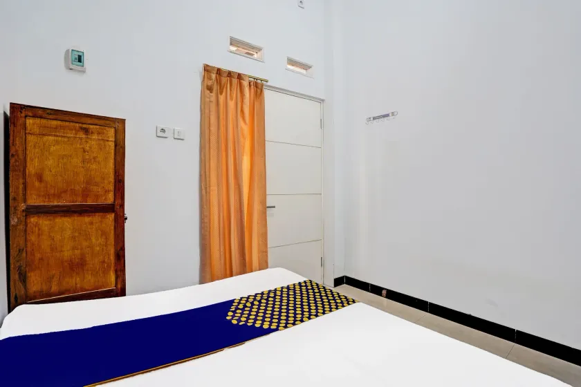 Hotel O Athirah Kost Near Permandian Wisata Istana Mappala - Habitación