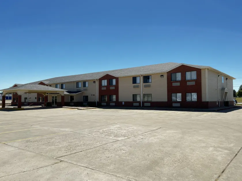 Designer Inn and Suites - Image 1