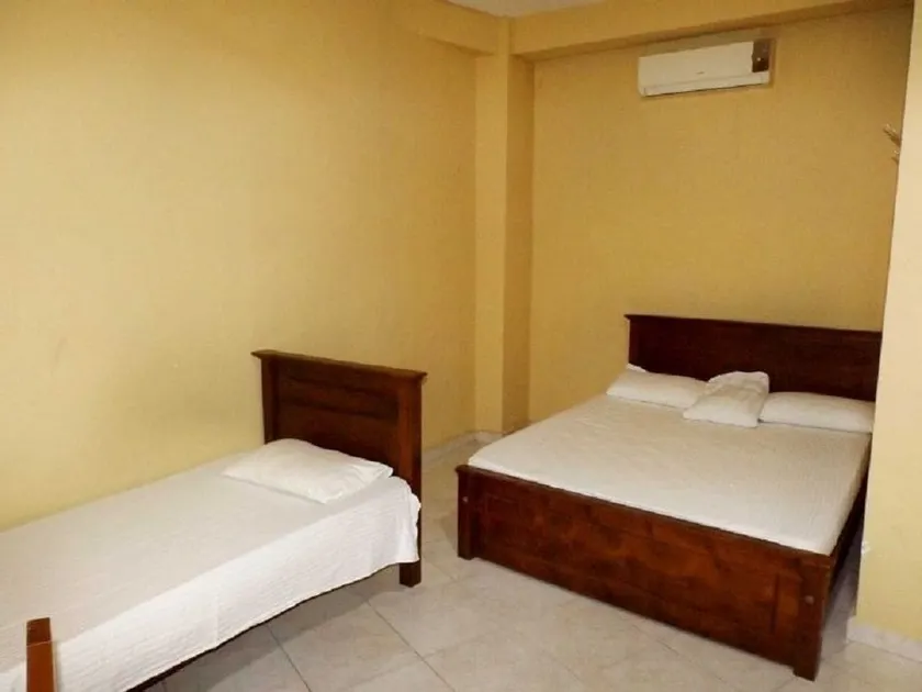 Omega Hotel & Motel - Image 1