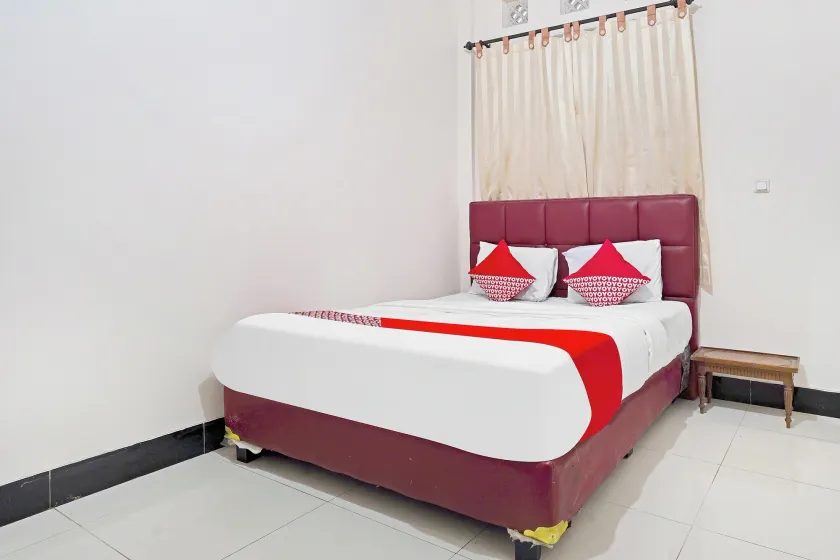 OYO 91322 Jawara Guest House Syariah - Image 1