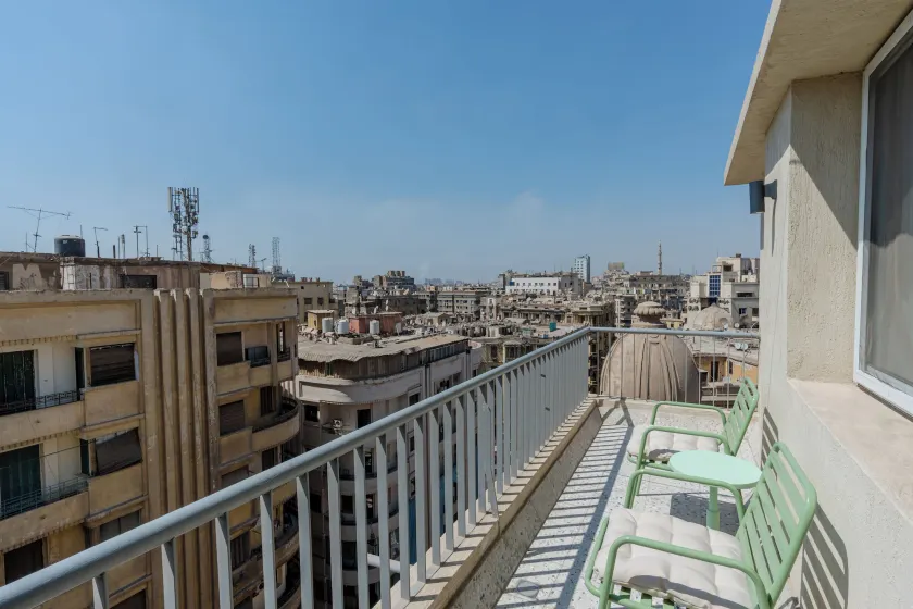 grey l studio apartments Downtown Cairo Ouzonian House - Image 1