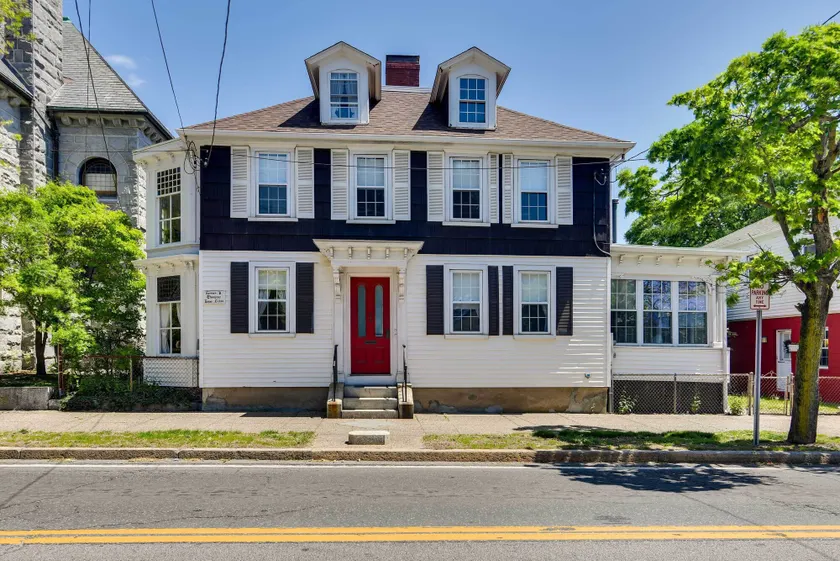 Walk to Warren Beach! Historic Building w/ 2 Units - Image 1
