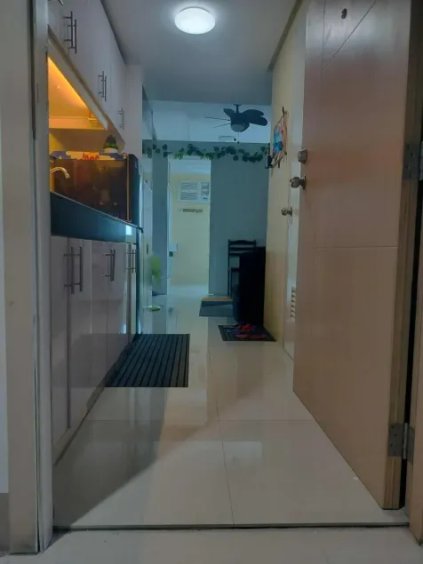 Spacious 1-Bedroom Condo in Quezon City with Private Pool - Image 1