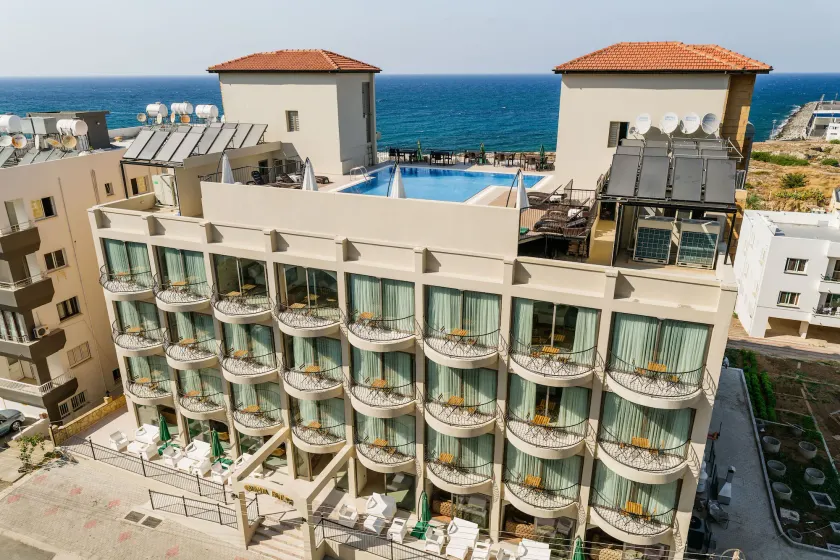 Olivia Palm Hotel - Image 1