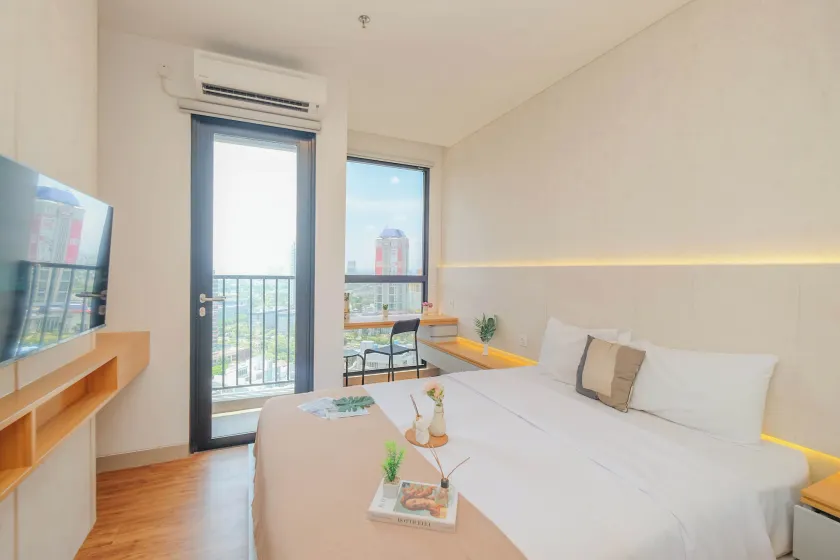 Stunning Studio at Ciputra World 2 Apartment By Travelio - Image 1