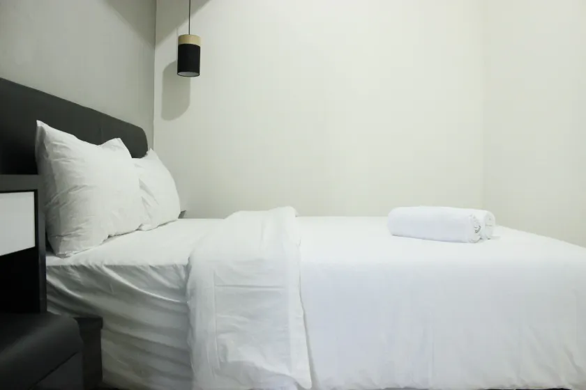 Direct Access to Pool 2BR Apartment at Parahyangan Residence By Travelio - Image 1