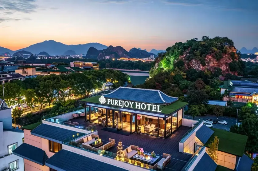 Guilin 5-star Purejoy Hotel - Elephant Hill -Two Rivers & Four Lakes Branch - English Speaking Service - Free Airport Pick-up for 2 Nights Only - Rooftop Bar & Spa - Image 1
