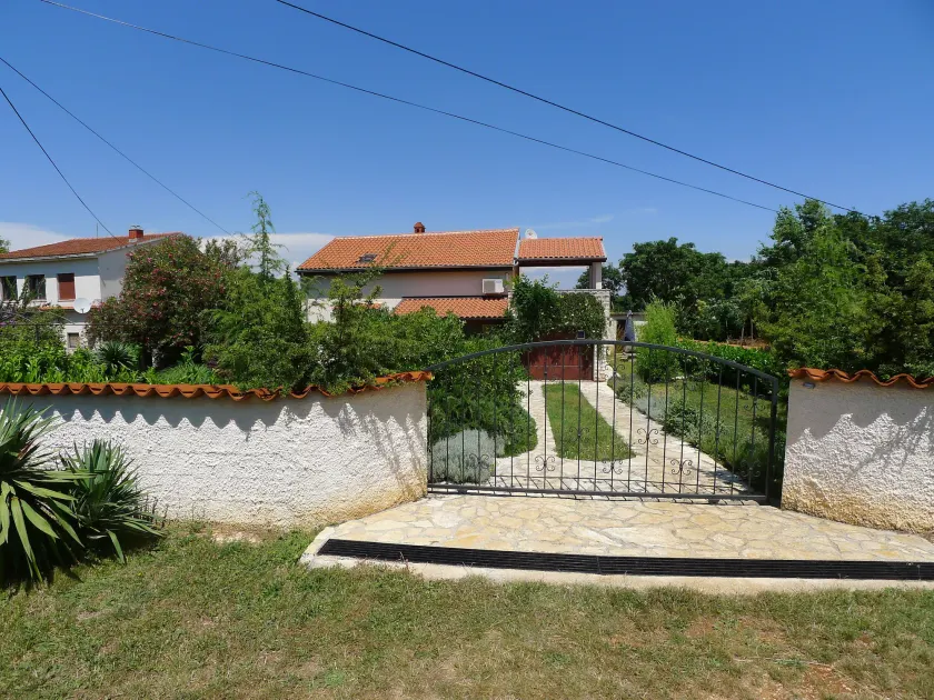 Apartment for 3 Persons in Quiet Part of Premantura With Beautiful Garden and Partial sea View - Image 1