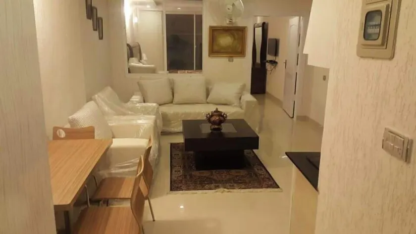 Bhurban continental Apartment - Coin salon dans le hall