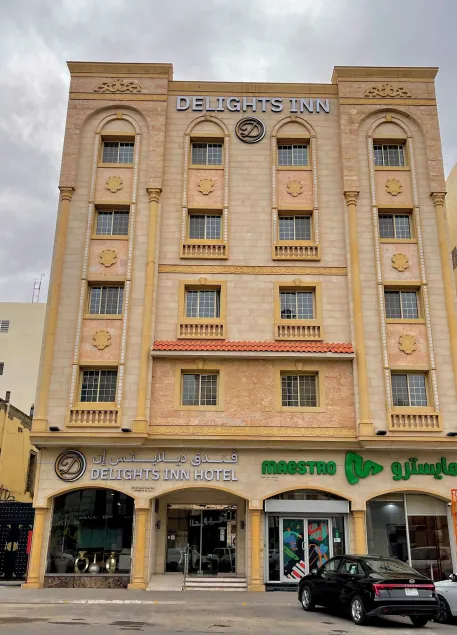 Delights Inn - Green Oasis Hotel - Image 1