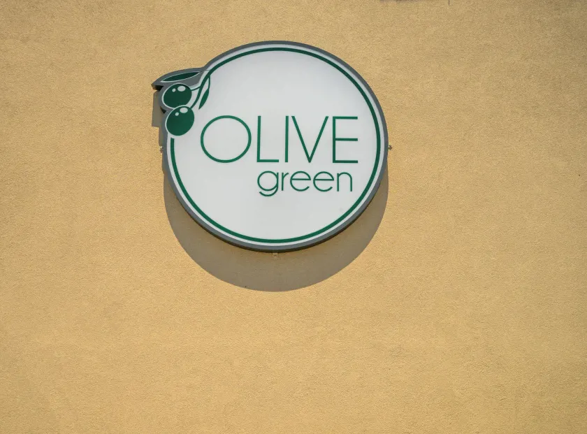 Olive Green Studios and Apartments - Image 1