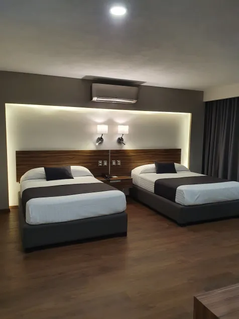 Estanza Hotel & Suites - Image 1