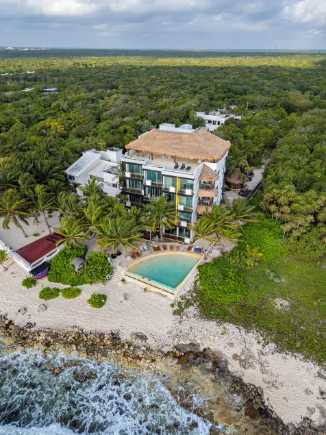 Angelina 28 Beachfront and Family Apartments - Modern and Relaxing Long Stays - 20 min from Cancun Airport - Image 1