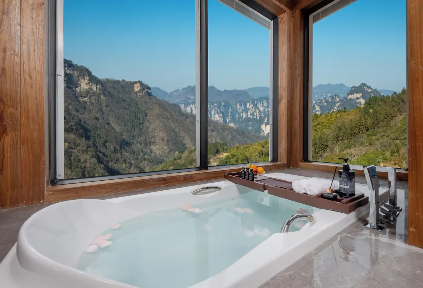 Zhangjiajie Valley Love Original Ecological Hotel - Free pick-up and drop-off Service - 24-hour Self-service coffee - Ice Cubes - Outdoor viewing Platform - Self-service laundry room Dryer - Free photography service in Hotel area - Image 1