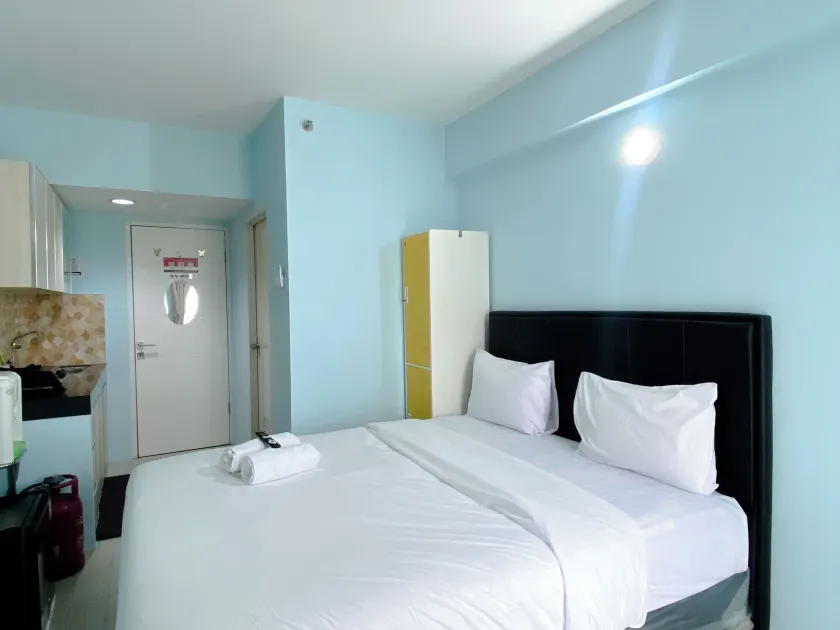 Minimalist Studio Grand Sentraland Karawang Apartment By Travelio - Image 1