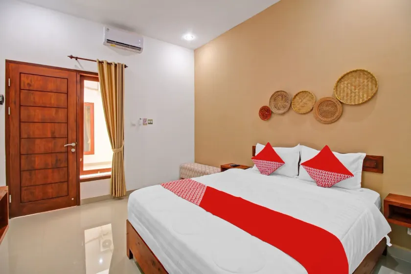 Hotel O Madania Guesthouse Syariah - Image 1