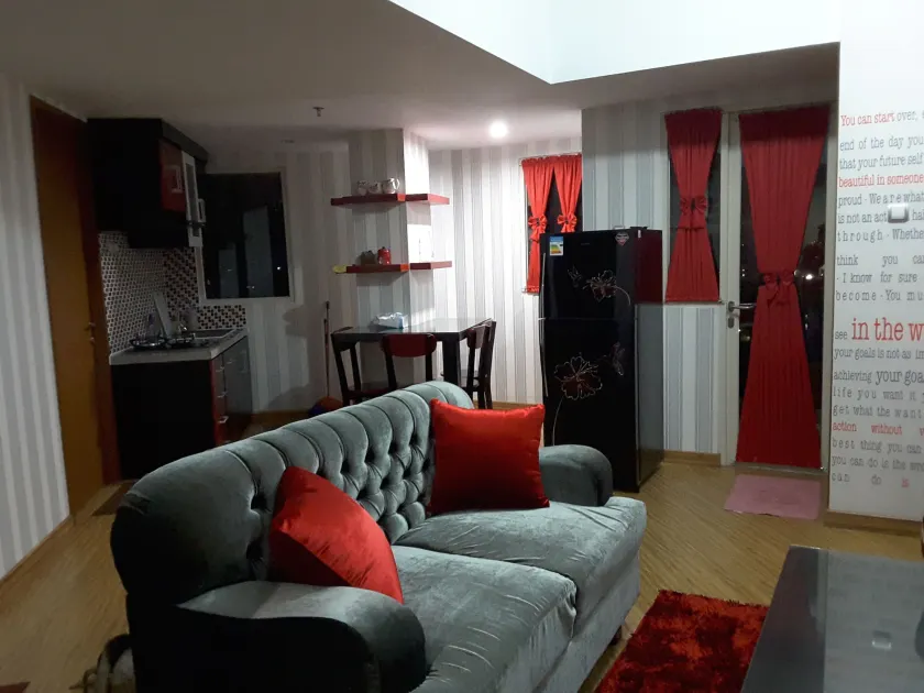 Apartemen Green Lake View Ciputat by Alfa Rooms - Image 1