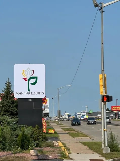 Posh Inn & Suites - Image 1