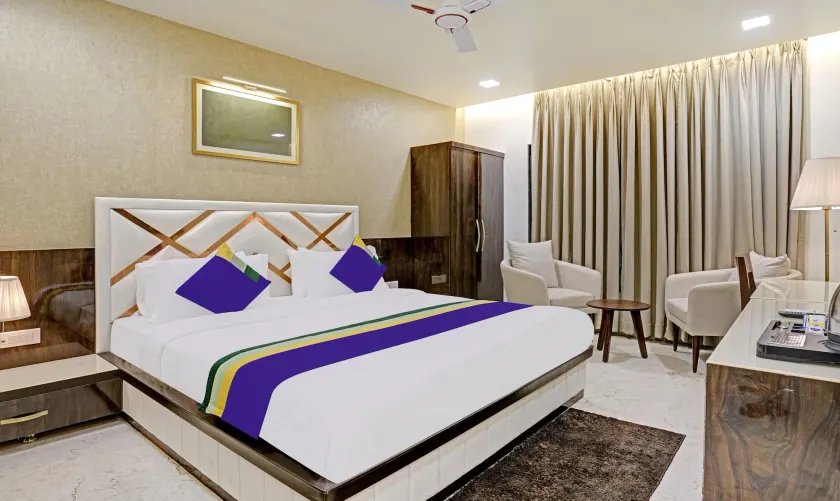 Treebo Premium Golden Bliss Trimurti Nagar Square - Image 1