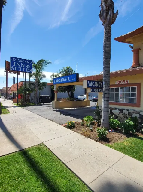 Delmonico Inn & Suites - Image 1