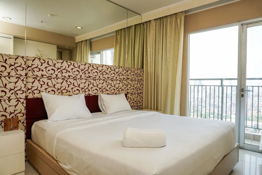 Trendy & Relaxing 2BR at The Suite Metro Apartment By Travelio - Image 1