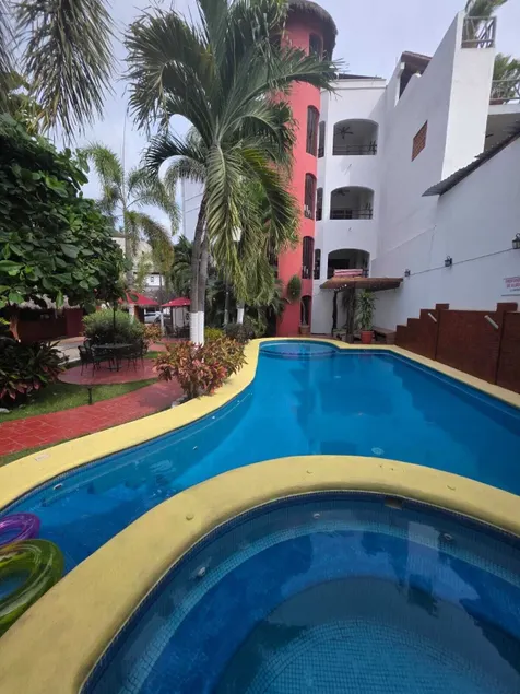 Hotel y Suites Los Encantos - Image 1
