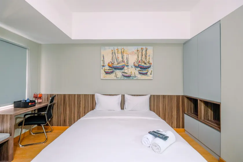 Comfortable Pool View Studio Room at Gateway Park LRT City Jatibening Apartment By Travelio - Image 1