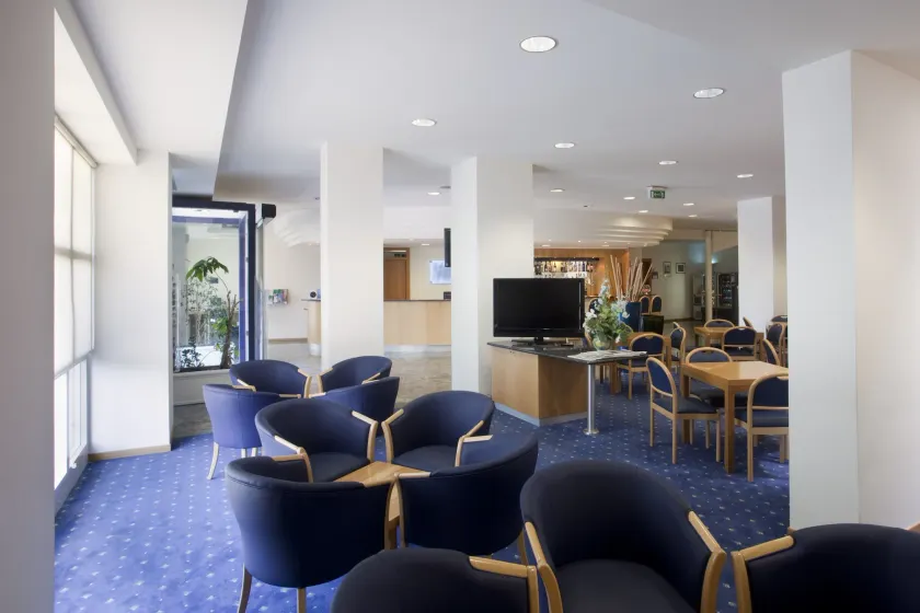 City Hotel & Suites - Image 1