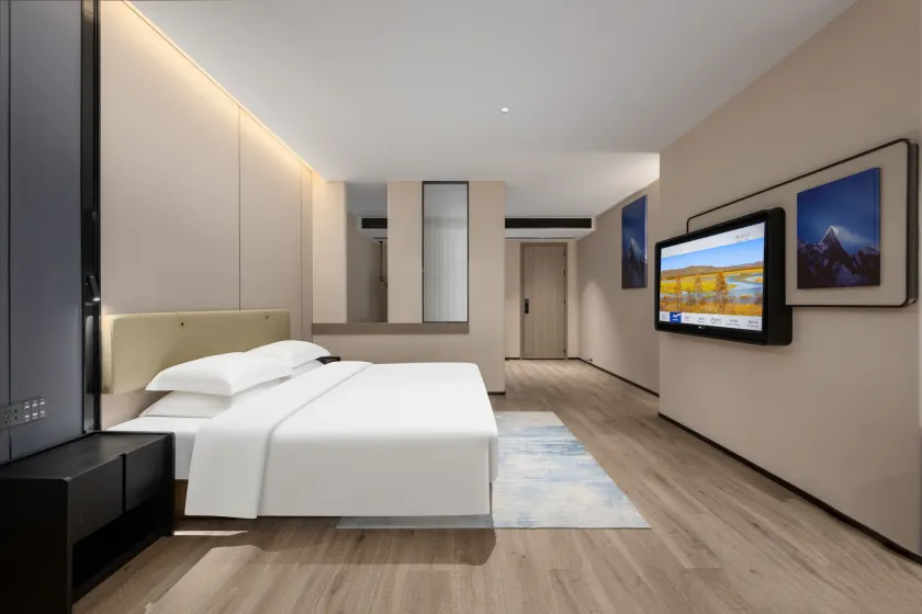Blue Coast International Hotel Guangzhou - Zimmer