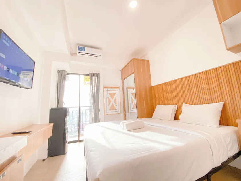 Homey & Restful Studio At Tamansari Panoramic Apartment - Image 1