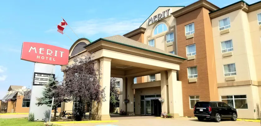 Merit Hotel & Suites - Image 1