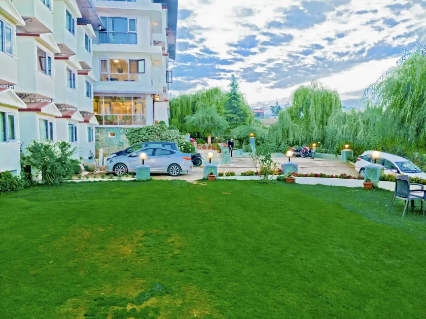 Royal Jardin Whistling Pines Resort - Image 1