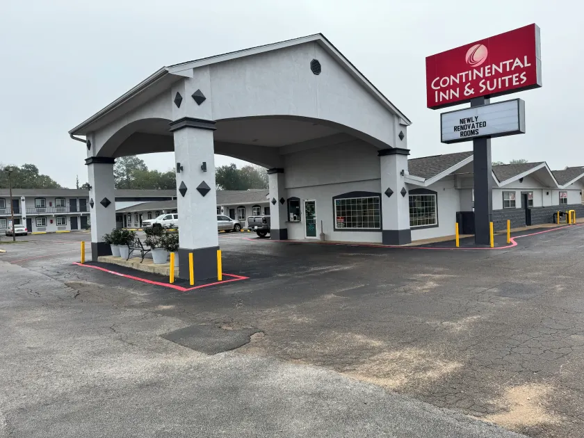 Continental Inn and Suites Nacogdoches TX SFA University Downtown - Image 1