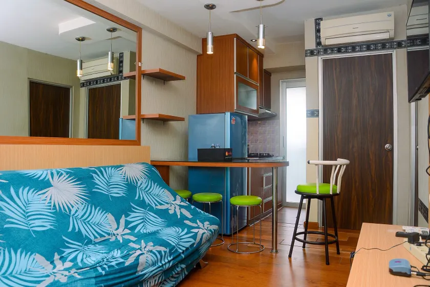 Beautiful 2BR with Direct Access to Pool Green Bay Pluit Apartment By Travelio - Image 1