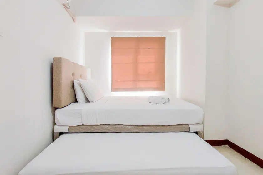 Comfort and Modern Look 2BR Loftvilles City Apartment By Travelio - Zimmer