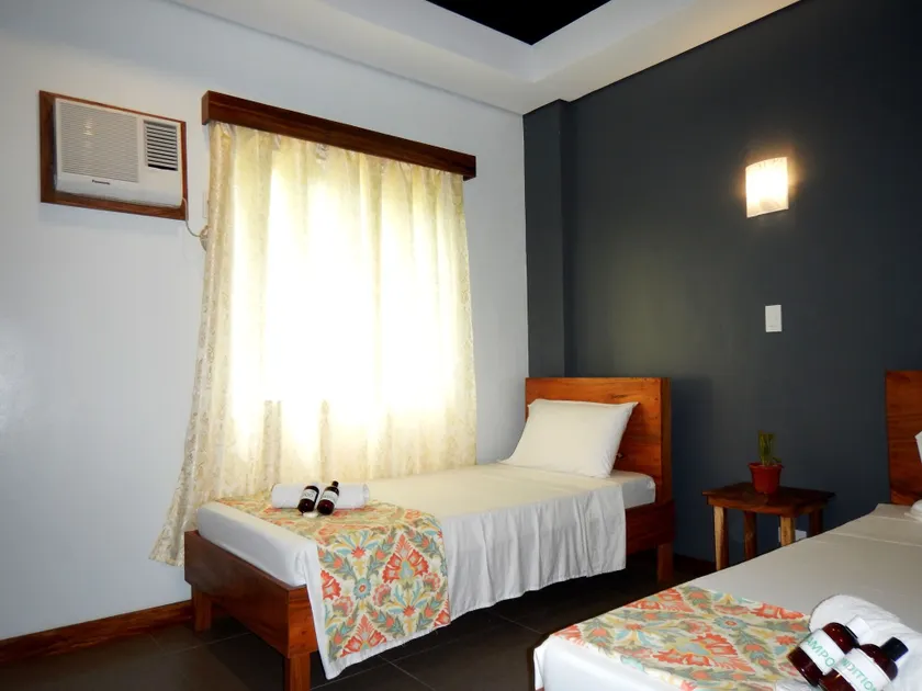 Acacia Garden Inn and Suites - Image 1
